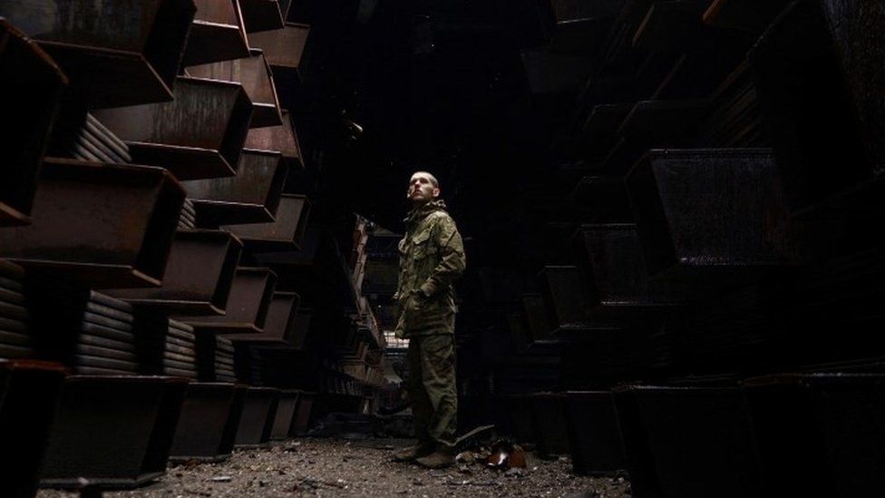 A Ukrainian soldier at the steelworks in Mariupol